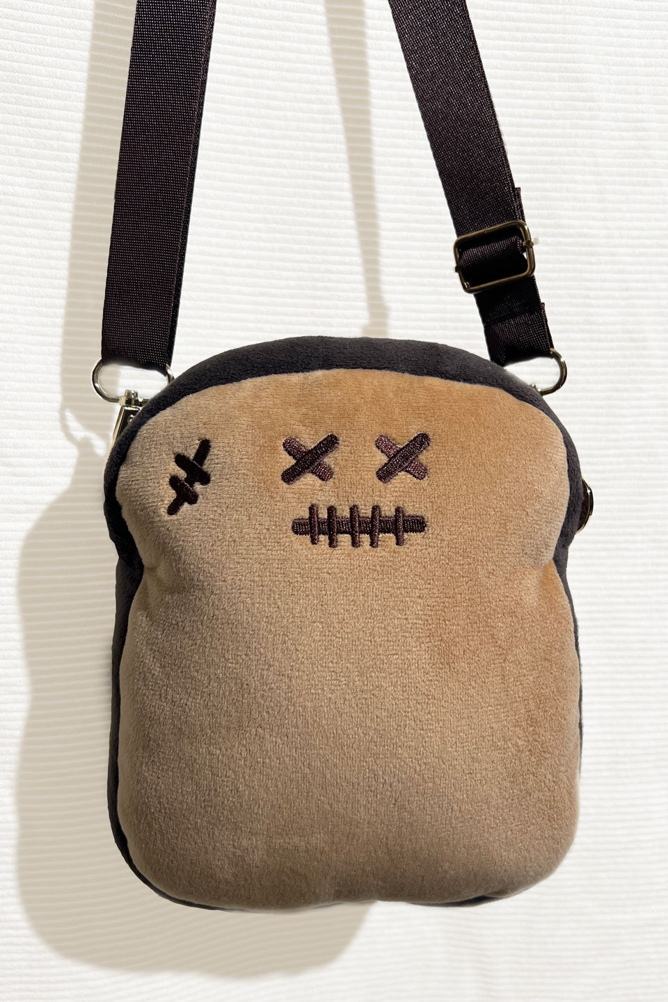 Toasty Sling Pouch Bag